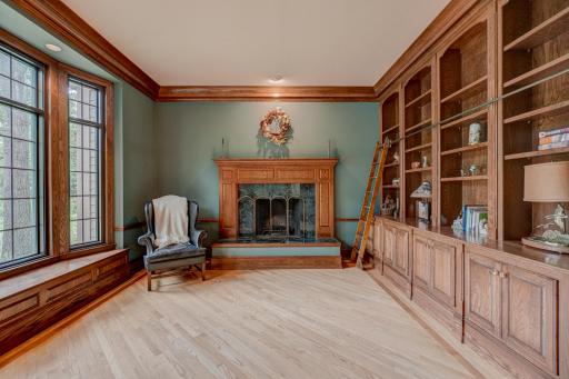 Lose yourself in the magic of the home’s library, where a ladder leads you to a wall of books waiting to be explored