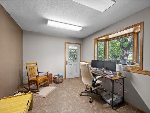 The office looks out to the front yard.