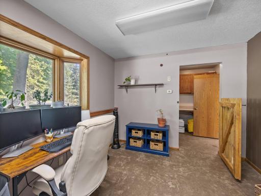 The office looks out to the front yard.