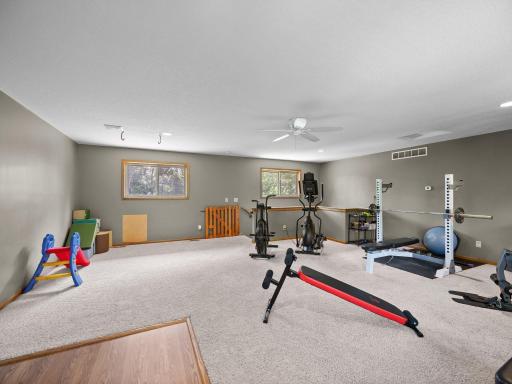 The upper level bonus room is perfect for a home gym.