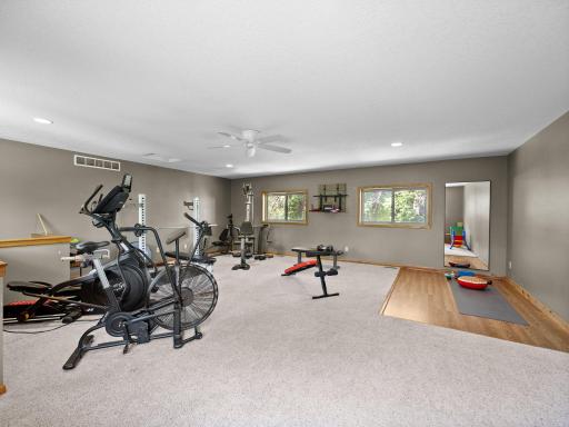 The upper level bonus room is perfect for a home gym.