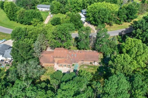 The aerial view shows off the privacy of this wooded 3.714 acre lot.