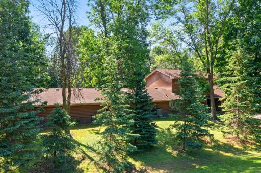 This property is lined with mature trees that offer privacy from the road.