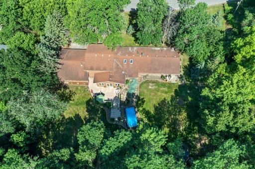 The aerial view shows off the privacy of this wooded 3.714 acre lot.
