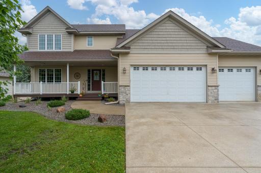Move-in Ready! Stunning 2 Story loaded with upgrades such as real wood floors, vaulted ceiling, Walkout basement, concrete driveway +++