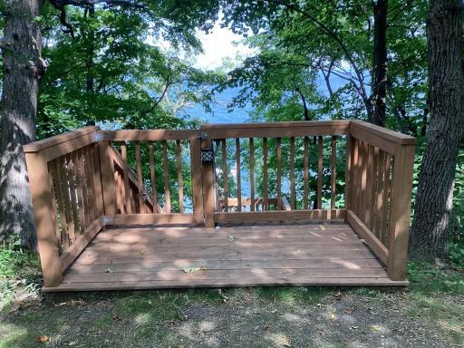 Deck to steps --Electricity down to shelf area