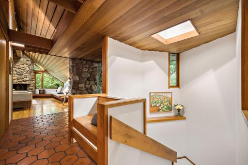 Built-in bench in front entry and beautiful staircase
