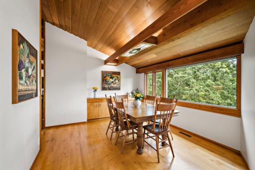 Spacious Dining Area with built-in buffet is open to Living Area and right off kitchen