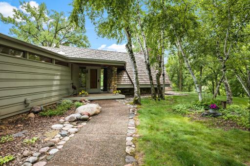 Welcome Home to 1680 Blackhawk Cove! This Mid-Century Modern Lake Front Retreat is nestled in a quiet cul-de-sac. Though it feels secluded, the home is just minutes from highways, shopping, restaurants, parks, trails, and COFFEE!