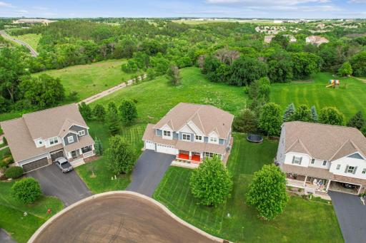 Nestled on a quiet cul-de-sac, this beautiful home backs to scenic green space with no neighbors behind—offering rare privacy and breathtaking views.