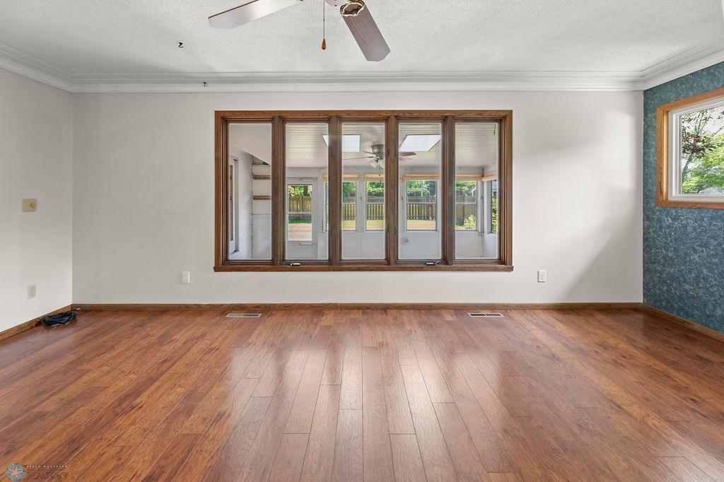 Large LR windows look out to 3-season Porch