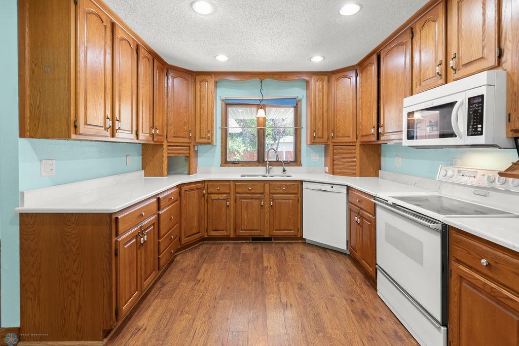 Spacious Kitchen looks out to front yard.