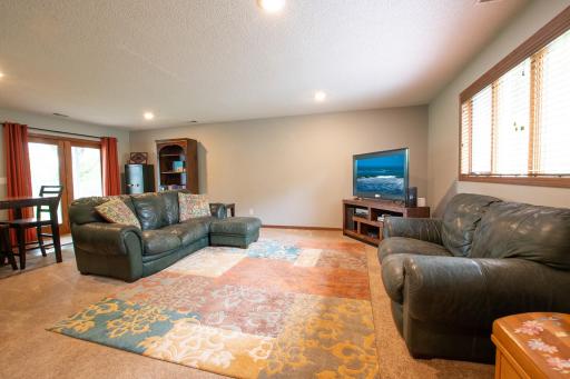 Lower level family room is perfect for entertaining and has a walkout patio door to backyard.