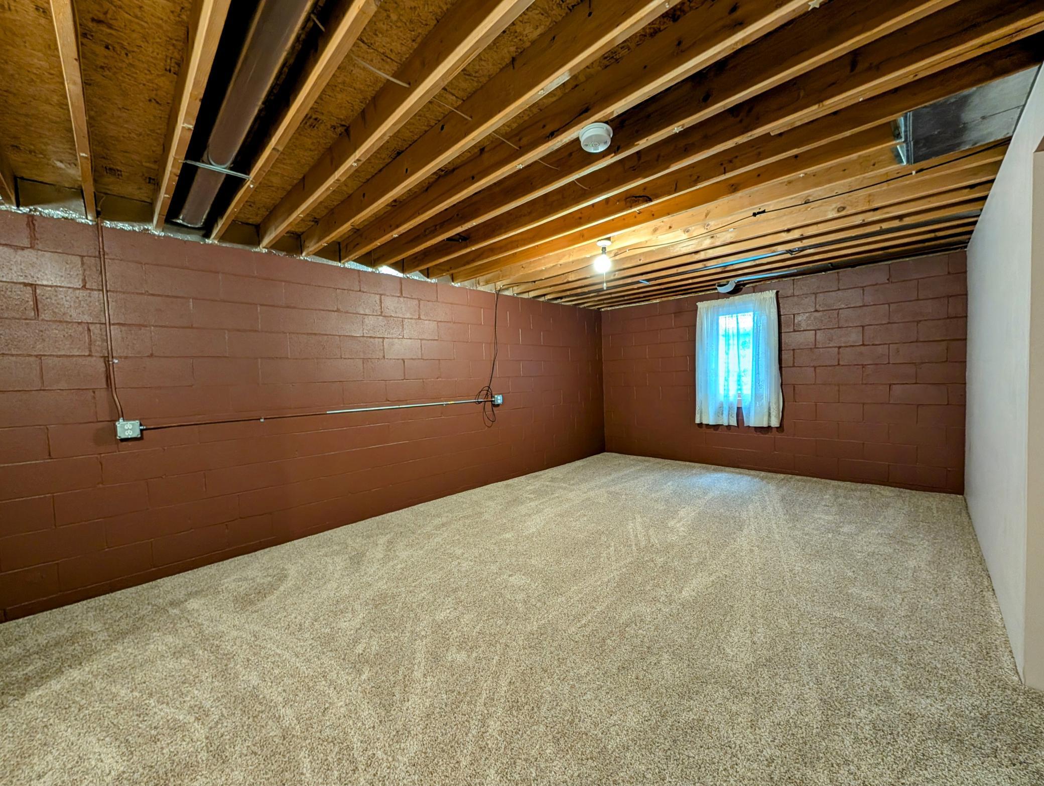 Plush new carpeting in lower level and richly painted walls invite large gatherings.