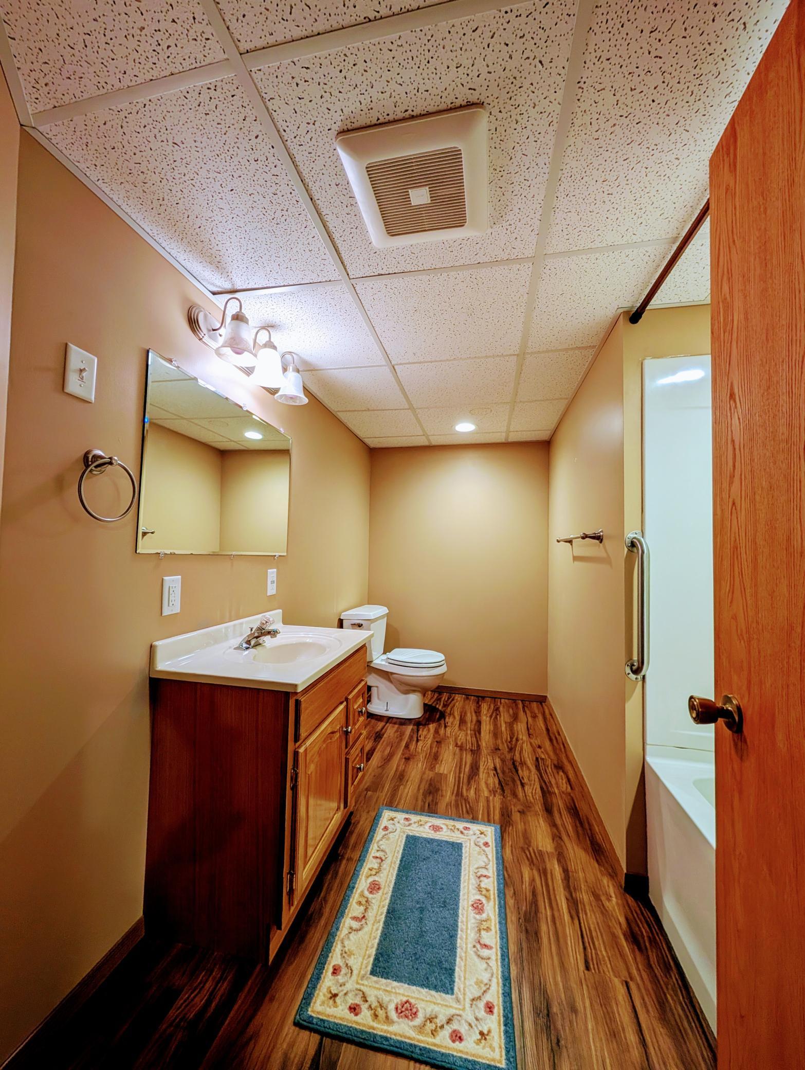 Fully finished full bath in basement.