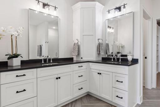 Dual sink vanity areas and great storage space for linens and bath supplies
