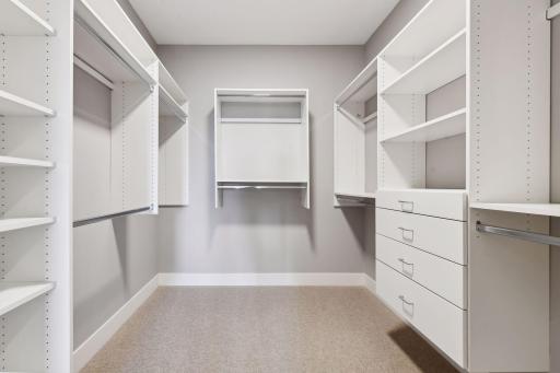 Walk-in closet with built-in organizational components