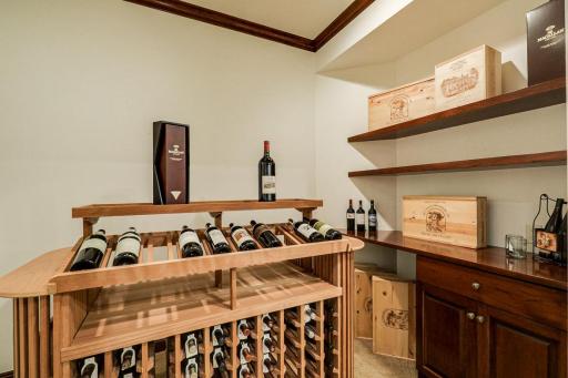 The lower level also boasts a dedicated workout room, an executive office, wine room, 2 large utility/storage rooms and a 2nd laundry room.