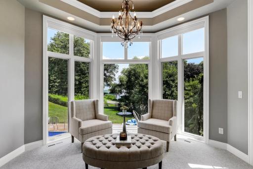 The massive primary ensuite boasts nature and water views from the bedroom and bathroom windows. A private deck provides a peaceful place to enjoy epic morning sunrises.