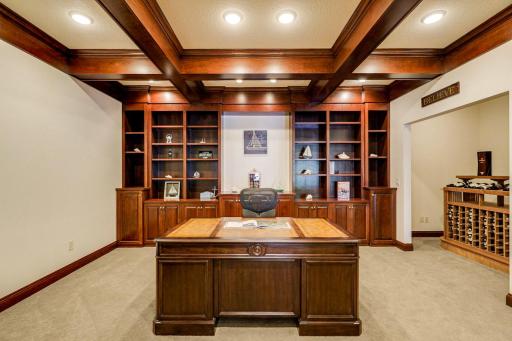 The lower level also boasts a dedicated workout room, an executive office, wine room, 2 large utility/storage rooms and a 2nd laundry room.