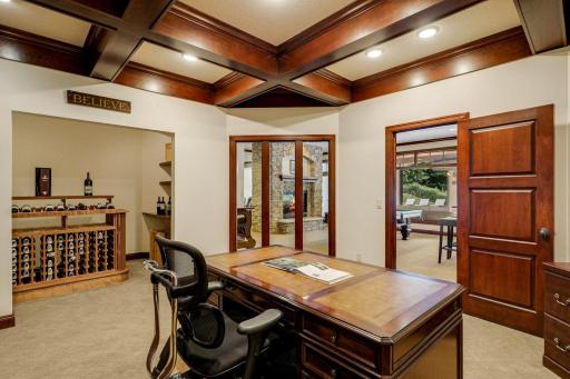 The lower level also boasts a dedicated workout room, an executive office, wine room, 2 large utility/storage rooms and a 2nd laundry room.