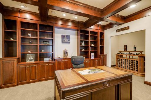 The lower level also boasts a dedicated workout room, an executive office, wine room, 2 large utility/storage rooms and a 2nd laundry room.