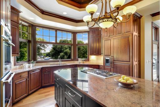 Experience epic sunrises over the lake while keeping an eye on both your dock and pool, all from the comfort of your chef’s kitchen, drenched in morning sunlight.