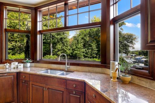Experience epic sunrises over the lake while keeping an eye on both your dock and pool, all from the comfort of your chef’s kitchen, drenched in morning sunlight.