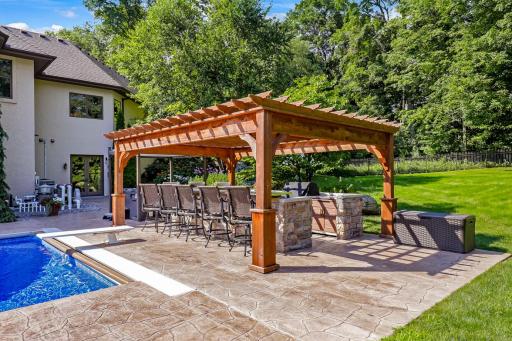 The outdoor kitchen is fully equipped. A natural gas line supplies the cooking station.