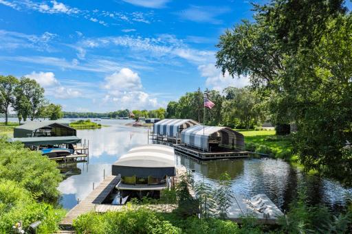 Walk through the gate in the backyard, then about 50’ down a very gradual slope to reach the owned lake frontage, which is nestled in a quiet inlet off Lafayette Bay, on Lake Minnetonka.