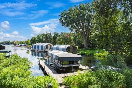 Walk through the gate in the backyard, then about 50’ down a very gradual slope to reach the owned lake frontage, which is nestled in a quiet inlet off Lafayette Bay, on Lake Minnetonka.