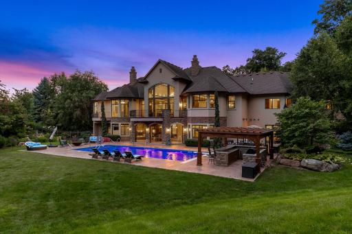The 1.4-acre, resort-like estate is completely framed by mature trees, providing the perfect blend of serenity, nature, and endless options for entertainment.