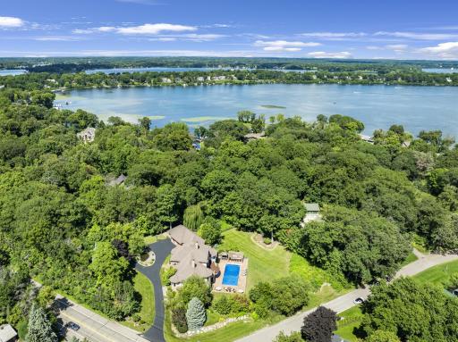 The estate is centrally located with a short walk or bike ride to Navarre, an 8-minute drive to Excelsior / Highway 7 and a 14-minute drive to Wayzata / Highway 12. Reach downtown Minneapolis in 27 minutes and MSP Airport in 35 minutes.