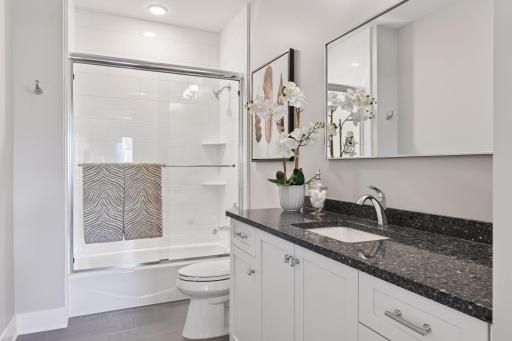 Ensuite full bath in the secondary bedroom