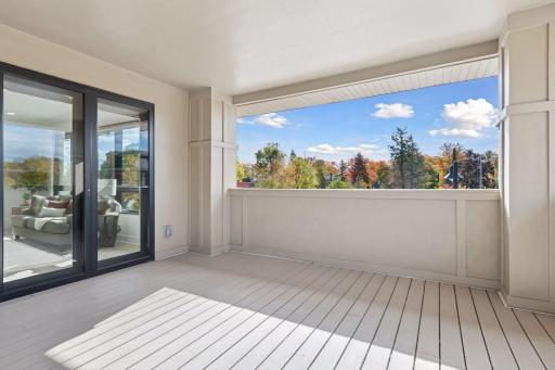 The oversized corner balcony provides covered space for outdoor enjoyment