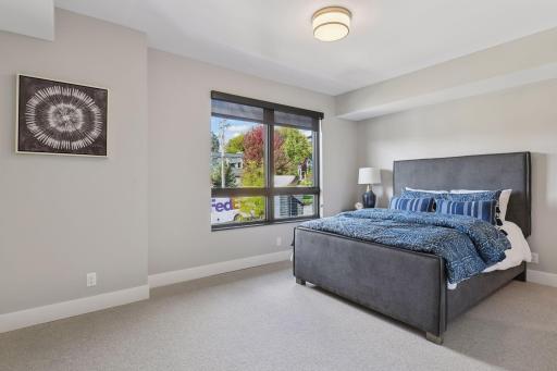 Spacious secondary bedroom with walk-in closet and en-suite full bath