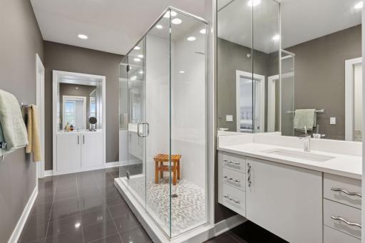 Tile shower with dual vanities plus additional storage