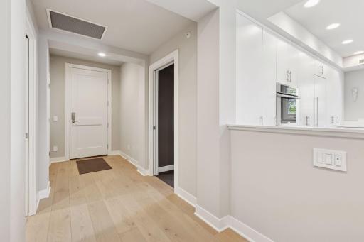 View of front entry and doorway to guest suite