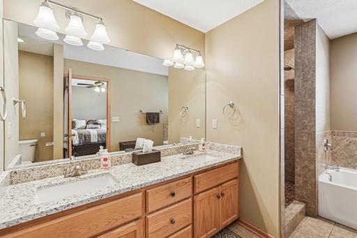 Primary private bathroom. Check out the walk-in and double sink.