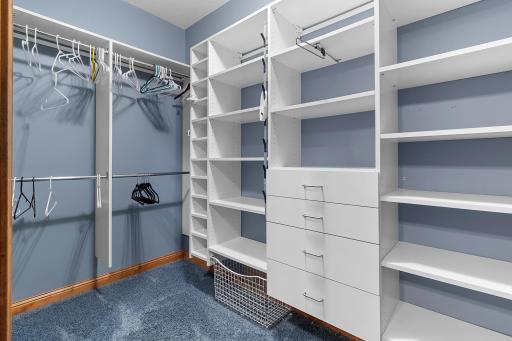 Lower-level first bedroom suite with walk-in closet.