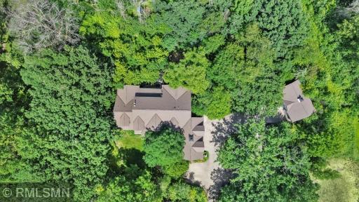 Ariel view shows newer architectural-shingled roofs on both buildings.