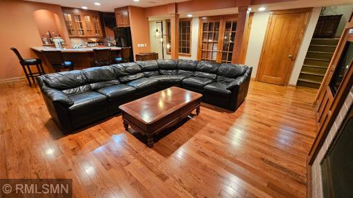 Lower-level recreation room with new solid oak hardwood floors