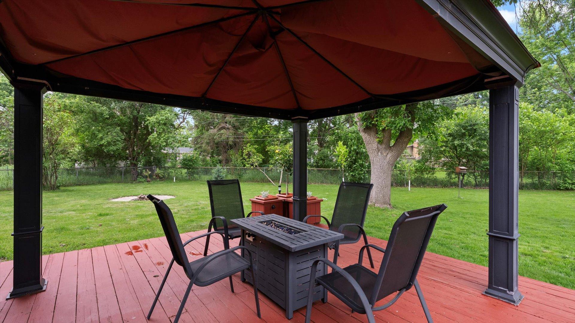 Large deck with canopy - canopy will need a new cover.