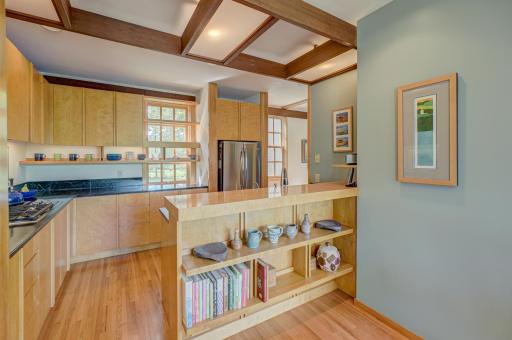 The 2012 kitchen remodel by Hagstrom Builder features custom maple cabinetry, soapstone countertops, and top of the line stainless appliances
