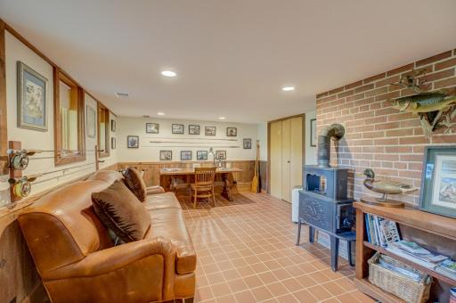 There is a large walk-in storage closet behind the custom maple doors.