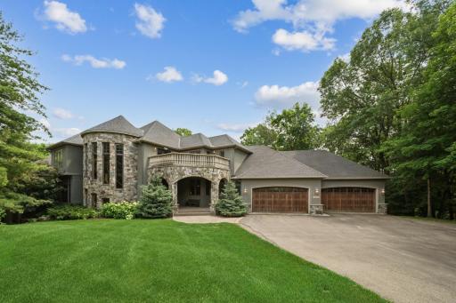 With its grand stone façade and castle-like presence, the home feels straight out of a fairytale.