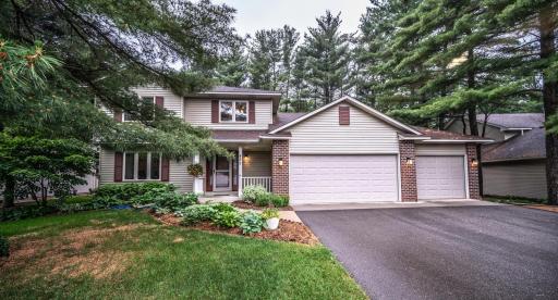 Situated on a quiet, wooded lot in a convenient Shakopee location. Maintenance free exterior features brick accent, new garage doors, extensive landscaping.