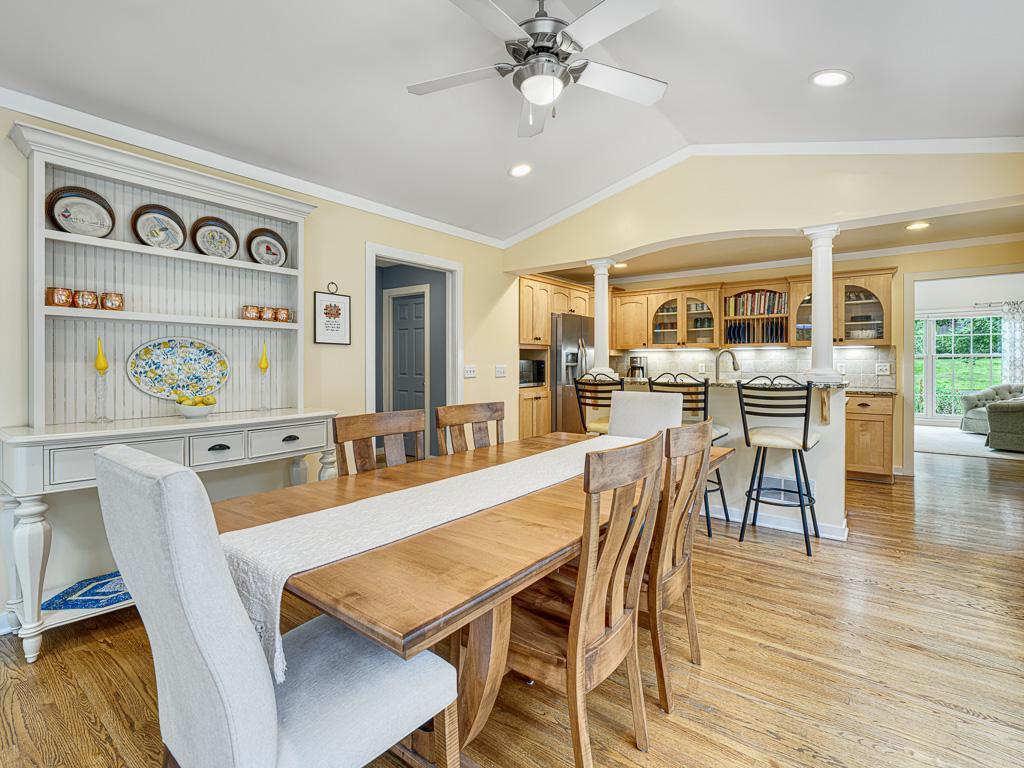Vaulted ceilings enhance the dining area’s elegance and amplify natural light