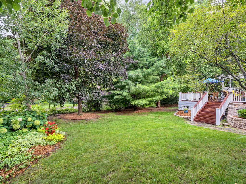 Enjoy a serene retreat in the beautifully landscaped, private oasis designed for relaxation