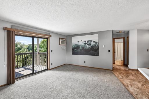 There is a fantastic deck just off the living room which offers wooded views. It is a perfect location to relax and unwind in the warmer months. You could also grow a container garden here.